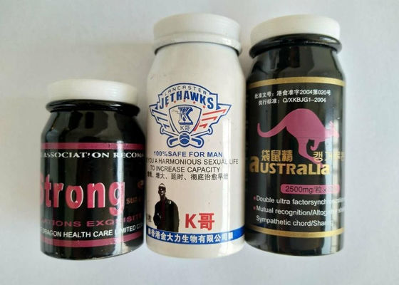 La bouteille en aluminium de la médecine 100ml pour des pilules marque sur tablette des capsules d'herbes
